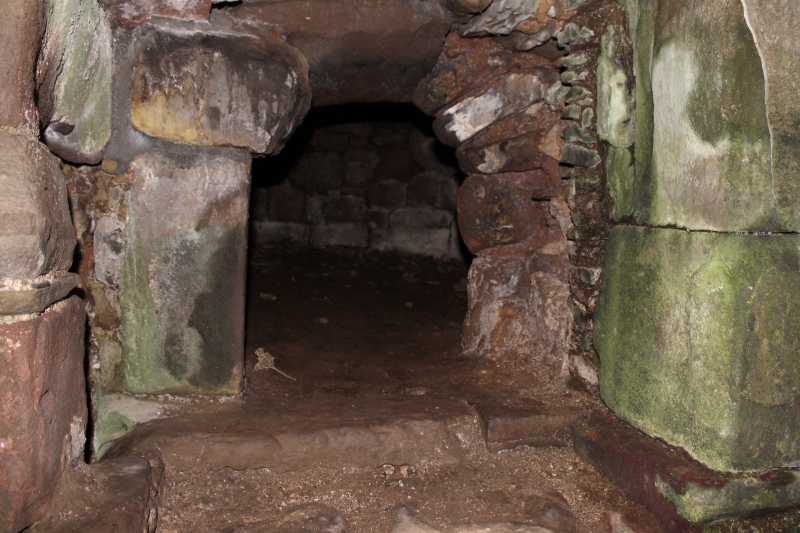 The entrance of the bread oven at Dunnottar Castle. The fire would be lit inside the oven to heat the surrouding stone, then once the desired temperature was reached the fire would be raked out and the bread quickly put in. The bread cooked thanks to the heat from the stones, and as they cooled a succession of items could be cooked with bread first followed by pies and more delicate items which needed a cooler oven. 